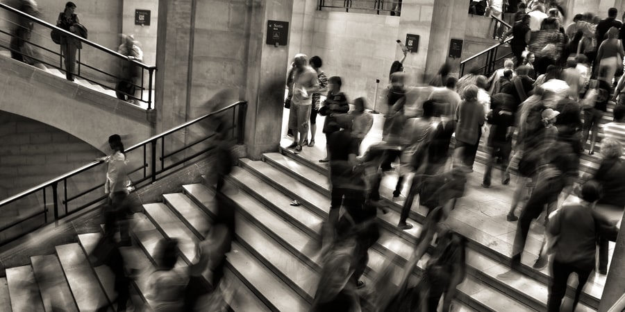 group of people walking on the stairs - Photo by José Martín Ramírez Carrasco on Unsplash